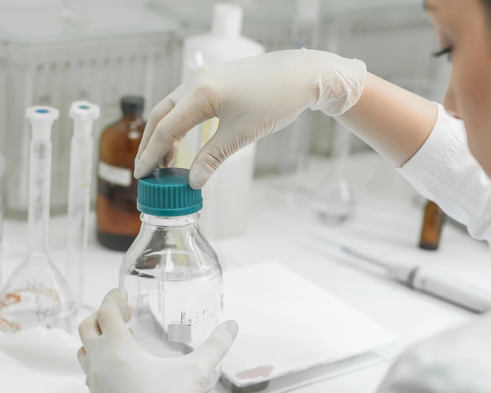Pharmacist preparing compounded medication in Bexley